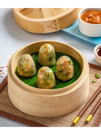 Crystal vegetable dumplings, with their translucent skin revealing the colorful filling inside.