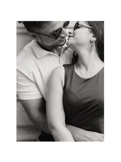 A classic black and white embrace. This pre-wedding portrait of Alicia and Jeff is simple, timeless, and full of emotion, focusing on the way they hold each other.