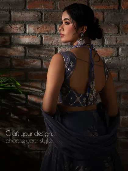 Craft your design, choose your style. The back of this lavender blouse features an intricate design with delicate tassels, showcasing my attention to detail.