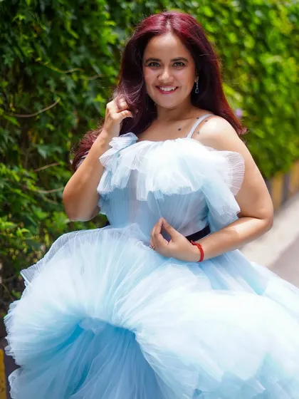 A close-up showing the happy expression of our client. Renting a dream dress for a special day is an experience I love to provide.