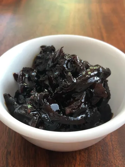 A close up of the Aam ki Mithi Chutney. It is a delightful mix of raw mango, jaggery, rock salt, and hing, made in small batches to ensure a wholesome, authentic flavor.