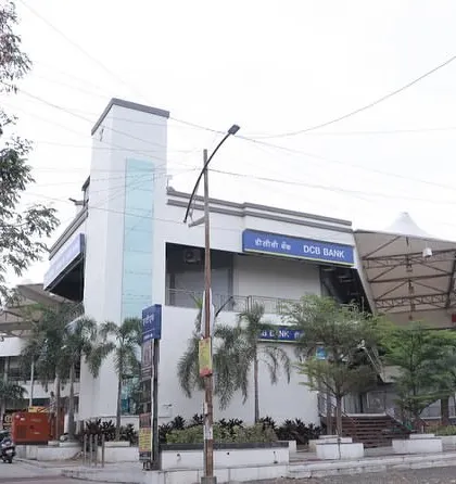 This view shows the glass lift shaft and the layered facade of the Ayur Mall. We prioritized using materials like glass and a tensile roof to create a sense of openness and reduce the reliance on artificial cooling and lighting.