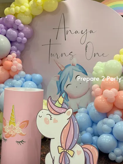 My unicorn themed parties are filled with magic. These images show various designs featuring balloon mosaic numbers, themed plinths, and beautiful pastel color palettes.