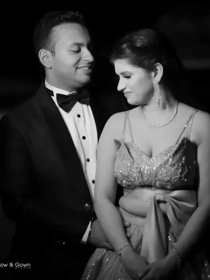 Another angle of a classic black and white engagement portrait. This shot captures their intimate connection and the elegance of the moment.