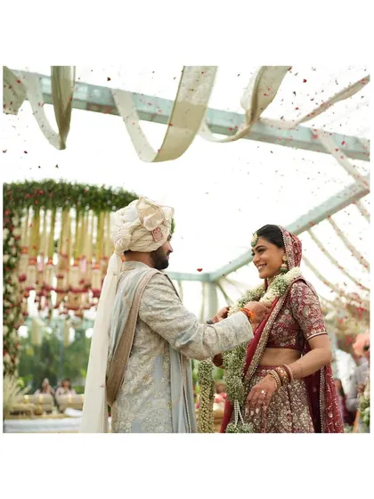 A bride's entry is one of the most emotional moments of a wedding. I ensure the focus remains entirely on her, creating a path that feels both grand and deeply personal.
