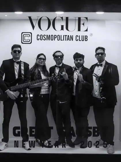 A stylish black and white shot from the Vogue Cosmopolitan Club's New Year party. We bring a touch of glamour to every performance.
