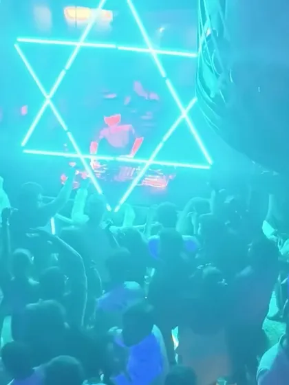 The neon Star of David setup at The Fixx provided a stunning backdrop for my Bolly-Tech set, matching the futuristic vibe of the music.