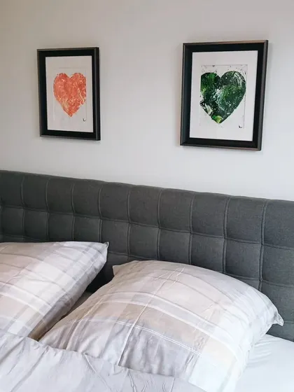Seeing my art in its new home is one of the best feelings. This client chose a pair of my heart paintings to create a serene and loving atmosphere above their bed. This is how art can transform a room, adding personality and a focal point that speaks to you.