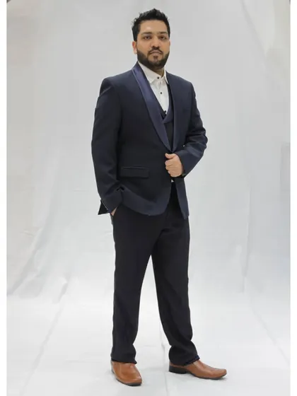 A full view of my formal reception attire. A well-fitted tuxedo is my go-to for creating a sophisticated atmosphere at evening events and cocktail parties.