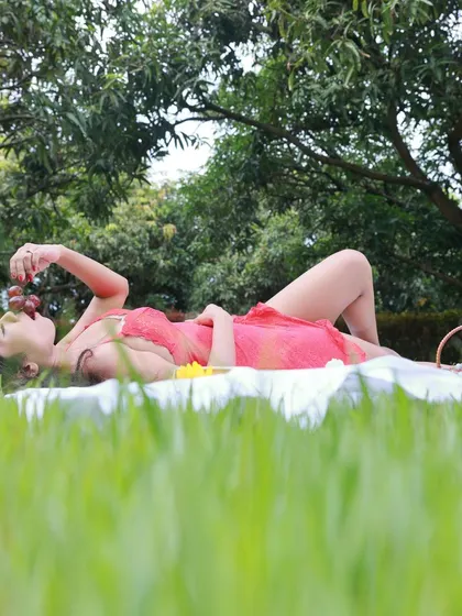 A low-angle shot from the picnic series, capturing a moment of relaxation and enjoyment.