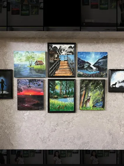 A closer look at the wall of my early paintings. This collection includes a variety of subjects, from landscapes and sunsets to wildlife. Each frame holds a memory and a lesson from my artistic journey.