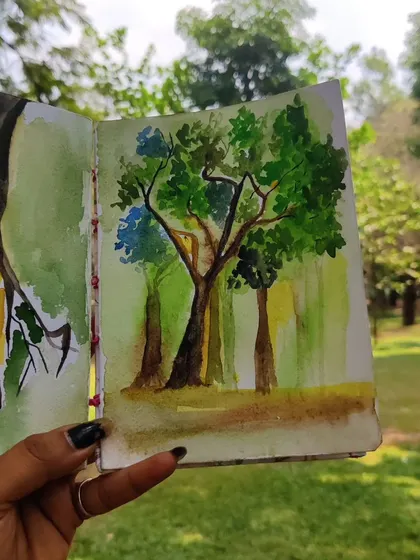 This is a page from my sketchbook, capturing the beautiful trees of Cubbon Park. My workshops often focus on painting what we see around us, from grand trees to tiny flowers.