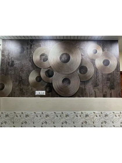 This custom wallpaper features a pattern of metallic discs on a dark, textured background. It's a great choice for a modern entertainment wall.