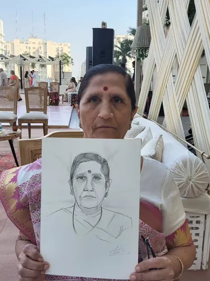 Seeing the smile on a guest's face when they see their finished portrait is the best part of my job. I love capturing the personalities of people from all walks of life, making sure everyone feels seen and gets a special keepsake from your event.