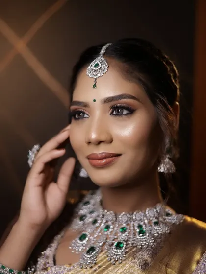 A close-up of a Muhurtham bridal look, focusing on the soft glam eye makeup and flawless skin finish that we teach in our pro courses.