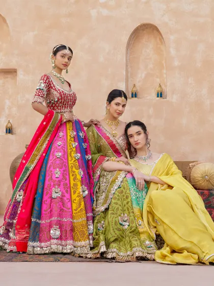 Your bride tribe deserves to look as stunning as you do. We create custom lehengas for the whole squad, playing with vibrant colors and unique designs that complement each other. From bold reds to festive greens and yellows, we'll make sure your entire crew is picture-perfect.