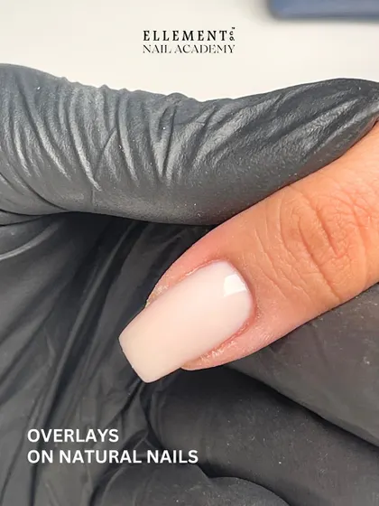 Student work showcase: A perfect, clean overlay on natural nails. This demonstrates the foundational skills our students master.