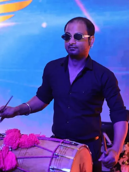 The dhol is the soul of our Punjabi sets. Our dhol player brings that authentic, powerful beat that you can feel in your chest, making it impossible not to dance.