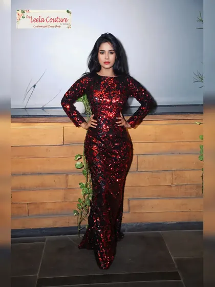 The simple silhouette of this gown lets the dramatic sequin fabric do all the talking. It's a powerful and confident look, custom-made for our client.