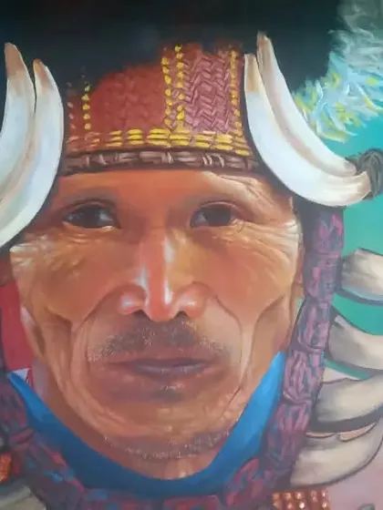 This realistic portrait of a tribal elder is an example of my focus on cultural narratives and ancestral memory. Executed on a university wall, the piece captures the subject's dignity and connection to heritage, using acrylics to achieve depth and lifelike detail.
