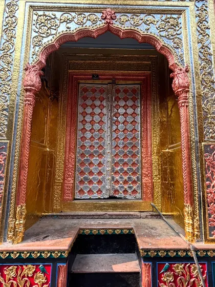 Another view of the stunning golden door in Naughara, Chandni Chowk. This is a favorite photo spot, representing the hidden beauty of Old Delhi.