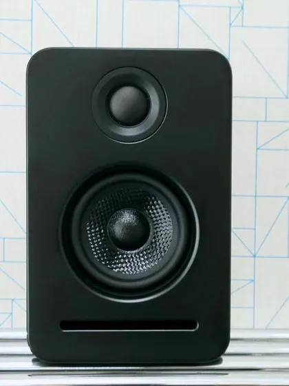 A closer look at one of the Platin Monaco satellite speakers. Each unit features dual drivers to produce a rich and dynamic frequency response. Because they are wireless, all they need is a power outlet, giving you complete freedom to place them for the best possible room-filling surround sound.