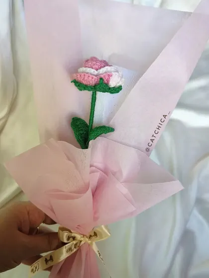 A handmade crochet rose bouquet in shades of pink and white. These make heartfelt gifts for any occasion, spreading love with every stitch.