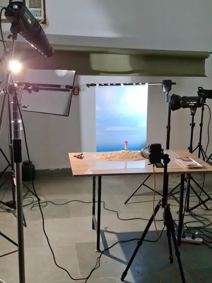 The full studio setup for the Mars "Blush Hour" beach scene, showing the background screen and multi-light configuration.