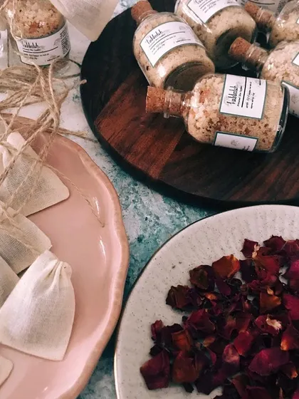 Getting a large order of my bath salts packed and ready to go. Each bottle is filled by hand and finished with a muslin tea bag for easy use.