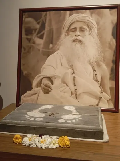 Sadhguru's padukas (sacred footprints) placed at the Sannidhi, a constant reminder of the Guru's grace that guides our every step on this path.