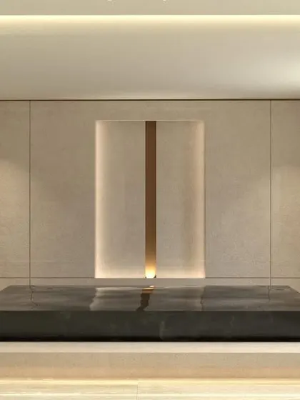 We designed this serene entrance with a calming water feature. The sound and sight of water greet you at the door, creating a tranquil transition from the outside world and bringing positive energy into the home.
