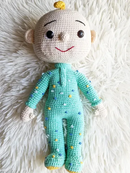The full-body view of my second JJ doll design, lying on a soft white background.