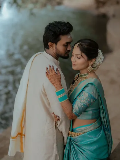 An intimate and artistic shot of the couple. The focus is on their connection, with the bride's beautiful profile and hairstyle highlighted.