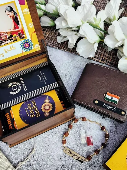 Another view of my wooden box Rakhi combo, this time showing a wallet customized with the Indian flag charm. You can choose from a variety of charms to match your brother's personality.