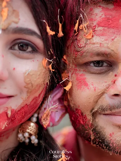 This is the raw, unfiltered joy I live to capture. A close-up from a Haldi ceremony, where the colors, textures, and genuine smiles tell a story of love and celebration that is beautifully messy and absolutely perfect.