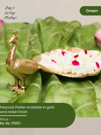 On the green-themed day of Navratri, our peacock platter becomes the star. Available in gold and nickel finishes, it’s an elegant piece for serving prasad or as a decorative accent.