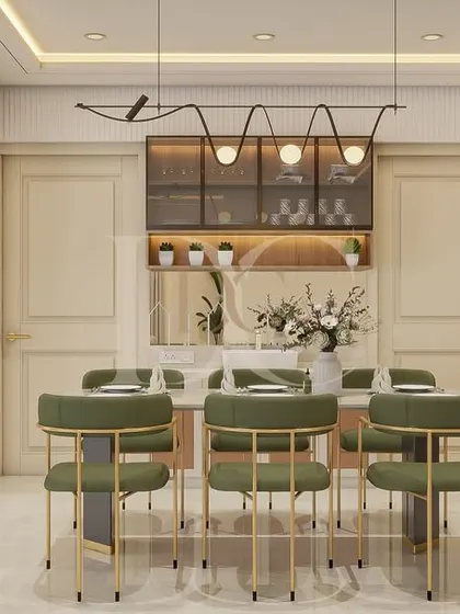 The dining area in this open-plan living room is defined by a modern hanging crockery unit and stylish green chairs. It’s a perfect example of how to create a designated dining space without closing it off.