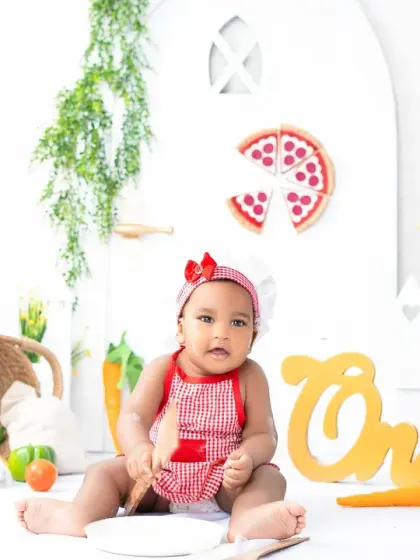 This little chef is ready to cook up some fun for her first birthday photoshoot. Themed sessions like this are a great way to celebrate milestones with creativity.