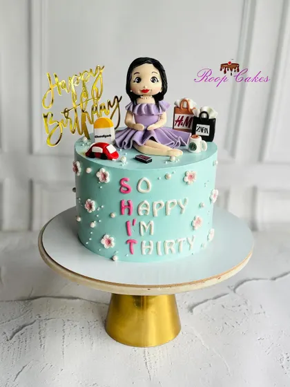 Celebrating three amazing decades with style and sweetness. This 'So Happy I'm Thirty' cake is topped with a custom figurine and her favorite shopping bags.