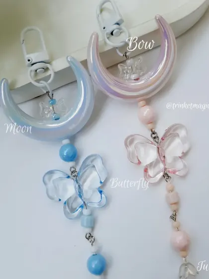 Inspired by moonlight and whimsy, these handmade charms feature a crescent moon and butterfly. I make them in dreamy blue and blush pink, perfect for adding a touch of magic to your bag or bottle.