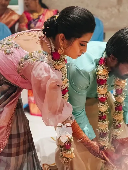 Kavya performing rituals in her stunning and unique blouse.