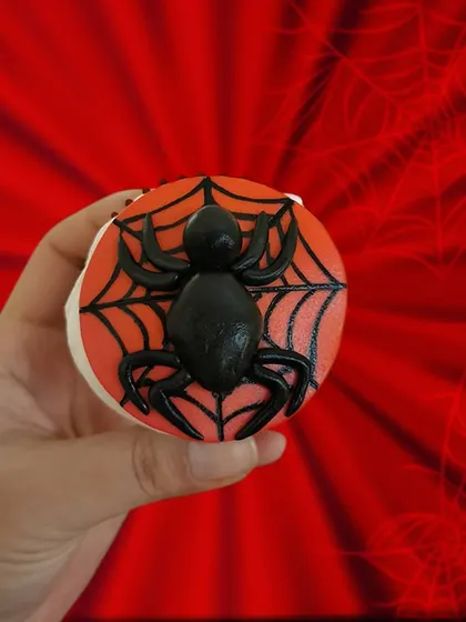 Here's a close-up of my Spiderman cupcake. I used fondant to create a clean, sharp design with the iconic web and a 3D spider. It’s a design that always gets the kids excited.