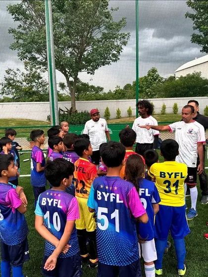 Our coaching staff gathered around the U9 team, providing instruction and encouragement.