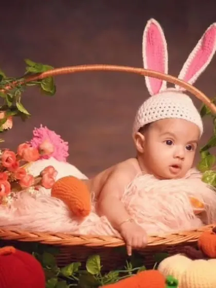 A client's adorable baby photoshoot featuring my bunny ear set, carrot, and pumpkin amigurumi props. It's amazing to see my creations as part of such special memories.