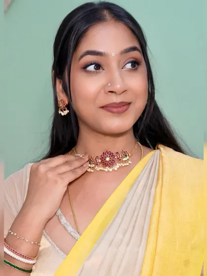 A close-up of the intricate choker, showing the beautiful craftsmanship and how it elevates a simple outfit.