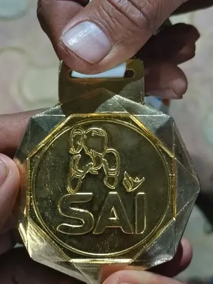 This is a gold medal from the Sports Authority of India (SAI). Winning these is a significant achievement for any young athlete and a goal we work towards.