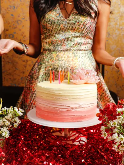 Capturing the celebratory atmosphere of a birthday party. This lifestyle shot is perfect for venues or brands wanting to associate their products with happy moments and special occasions.