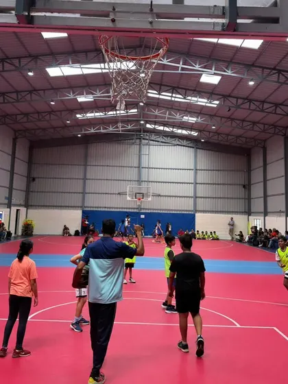 A coach guiding his young team on our court, a perfect environment for learning and development.