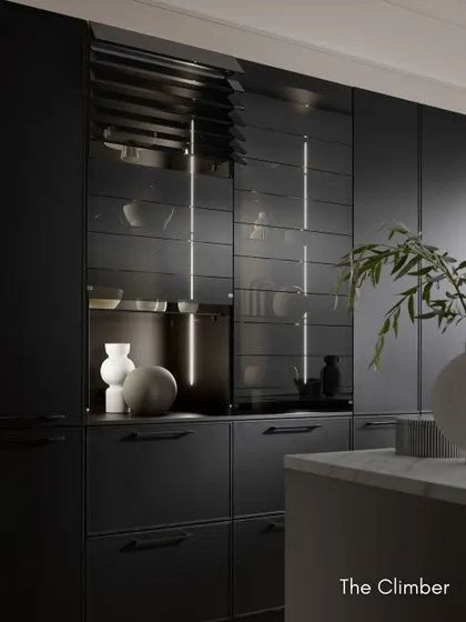 The "Climber" cabinet with its sensor-controlled glass slats. The tinted glass and ambient lighting create a dramatic display feature for your finest glassware.