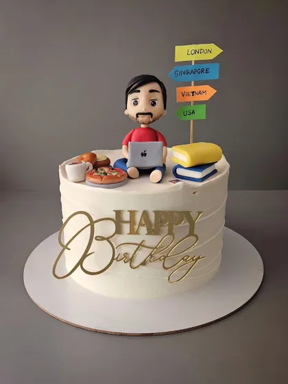 The Dude. A cake for a man who loves to travel, read, and work on his laptop. This cake captures all his favorite things in one edible creation.